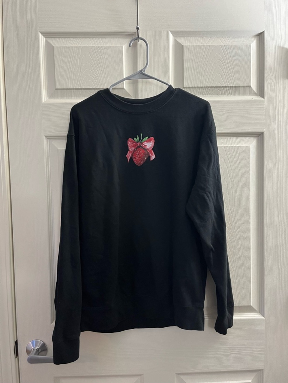 Black Sweatshirt with Red Strawberry Graphic